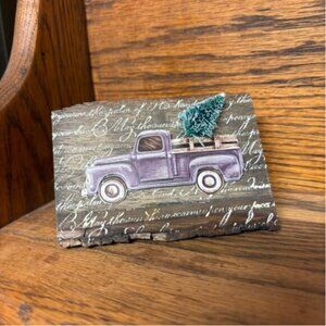 Three Dimensional Rustic wooden plaque with vintage truck with a Christmas tree.